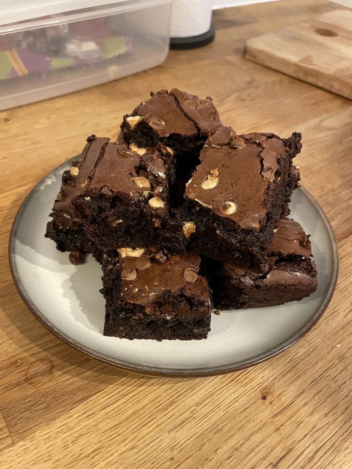 Chocolate brownies cut into squares on a plate